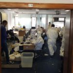 Kosovo officials counting votes from Serbia in protective garments Voters