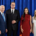 Vucic, looking anxious, poses for a photo photo with the US president and his wife