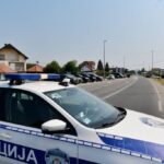 Who is the Albanian suspect wanted by the police for the murder of a Serbian police officer in Loznica?