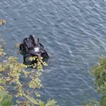 Car Slides into Gazivode Lake While Men Take Photos